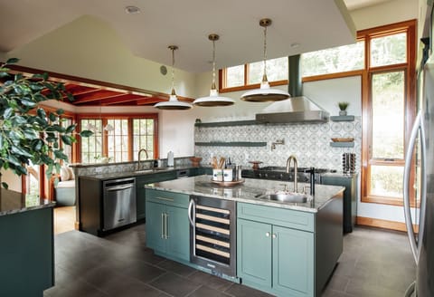 Main kitchen with high-end appliances & custom design.