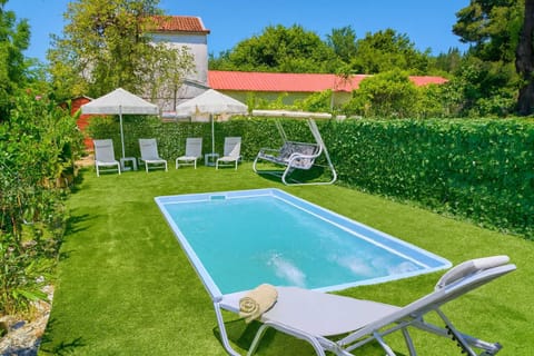 Cool off with a swim or soak up the sun on the inviting loungers