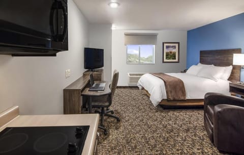 Sink into the plush king bed after a long day.