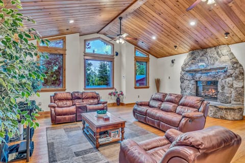Living room (upper floor): Gas fireplace, 55” Smart TV, Pioneer surround sound, ceiling fan
