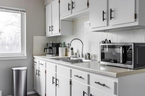 Create Delicious Meals in Our Fully-Equipped Kitchen, Just Like Home. Includes Full-Size Fridge, Stove, Microwave, Coffee Maker, Toaster, and More.