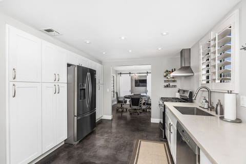 Kitchen Hallway – Ample counter space and storage for easy meal prep.