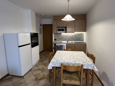 Flooring, Floor, Furniture, Major Appliance, Wood, Interior Design, Kitchen Appliance, Kitchen, Room, Cabinetry