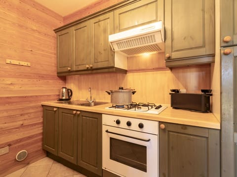 Wood, Cabinetry, Interior Design, Kitchen, Flooring, Furniture, Ceiling, Major Appliance, Floor, Kitchen Appliance