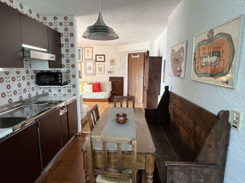 Furniture, Interior Design, Flooring, Wood, Floor, Ceiling, Room, Table, Lighting, Light Fixture