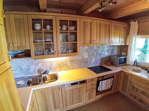 Wood, Flooring, Furniture, Kitchen, Cabinetry, Countertop, Floor, Interior Design, Kitchen Appliance, Wood Stain