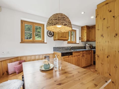 Interior Design, Wood, Furniture, Flooring, Ceiling, Cabinetry, Floor, Lighting, Kitchen, Countertop