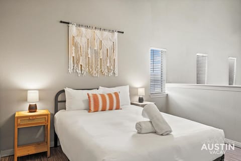 Queen bedroom with custom hotel quality linens in the loft