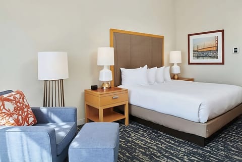 Lounge by the armchair, then drift off in king-bed bliss.