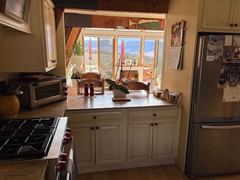 Open kitchen view to dining area and living room