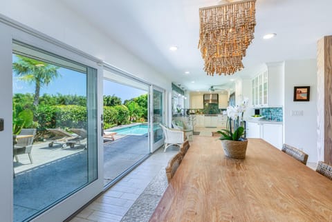 Designed for island living, the open-concept layout flows effortlessly to the lanai—blurring the lines between indoors and out with ocean breezes, natural light, and space to truly unwind