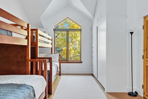 Bunk room with two sets of twin over full beds