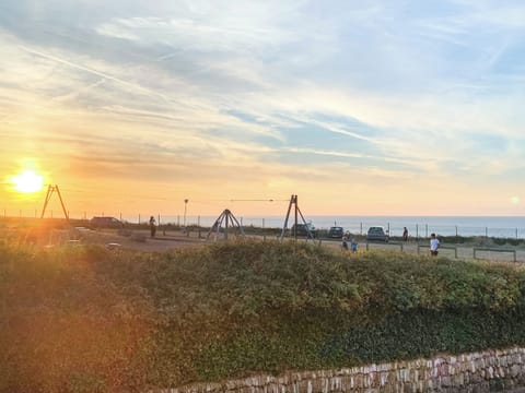 Views over the playground and Golf Club to the sea | Atlantic Hideaways, Newquay