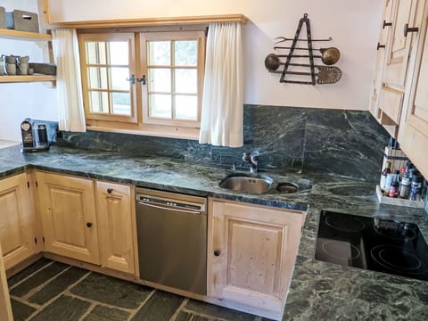 Countertop, Cabinetry, Kitchen, Plumbing Fixture, Natural Material, Kitchen Sink, Wood Stain, Hardwood, Sink, Marble