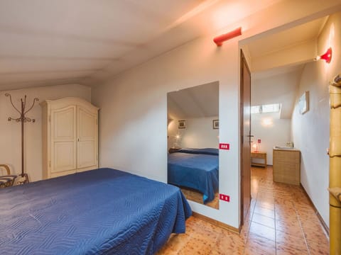 Furniture, Flooring, Wall, Interior Design, Floor, Bed, Bedroom, Wood, Ceiling, Room