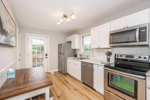 The open dine-in kitchen is well equipped for an unforgettable getaway