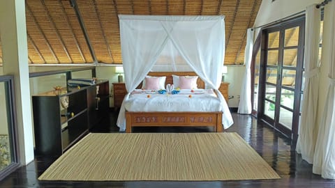 Bedroom 4 with a king bed, located upstairs