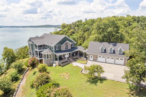 Front of House and Garage (Full Water View from front 8x20ft porch)