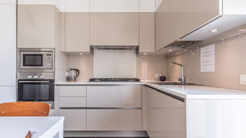 living and fully equipped kitchen