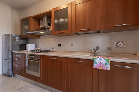 living and fully equipped kitchen
