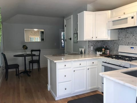 Full kitchen, stocked with all the basic cooking necessities to start your stay!