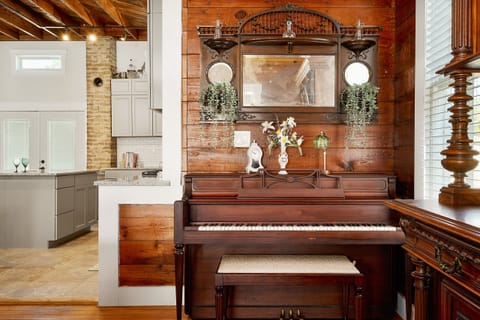 Bring it back to the days of old with a singalong on the upright piano.