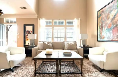 From front door to the Living Room with Vaulted 2-story ceiling. New windows.