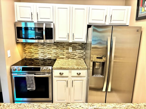 All stainless steel appliances, including a dishwasher.  Sink also has disposal.