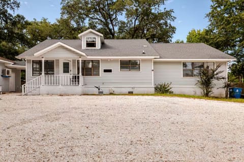 Spacious coastal home with plenty of parking and charming curb appeal.