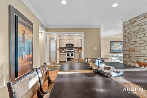 Cowhide chairs and wood inlays add a little Texas flair to your dinner plans.