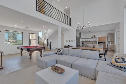 Living room and pool table.