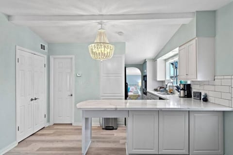 Savor the art of culinary bliss in our kitchen, where every detail is a tasteful combination of style and functionality