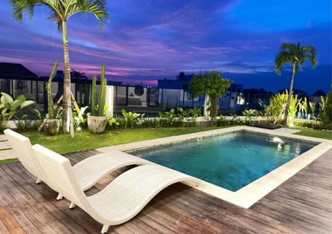 An enchanting space featuring a stunning swimming pool—where tropical style meets privacy for an unforgettable Bali experience. #Villa Ranakah