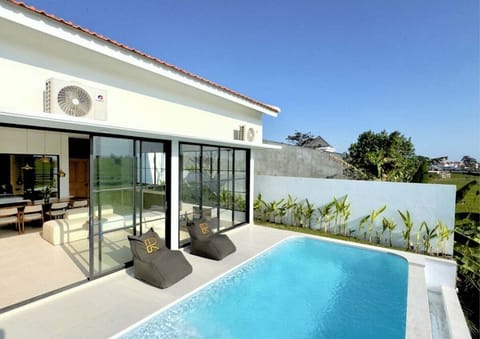 An enchanting space featuring a stunning swimming pool—where tropical style meets privacy for an unforgettable Bali experience. #Villa Patuha