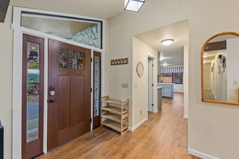 Foyer leading to the kitchen and laundry room