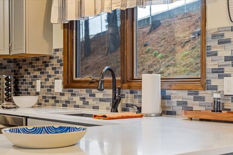 The kitchen was recently remodeled with plenty of prep space for meals!