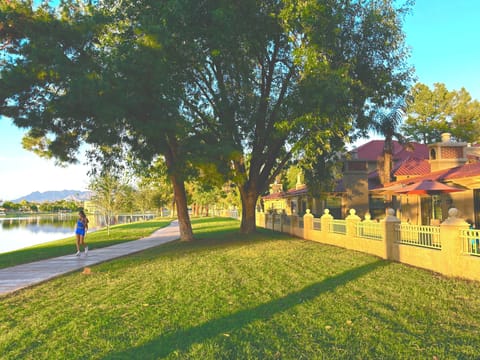 Your Villa fronts on McCormick Lake & 28 Mile Path with Mountain Background