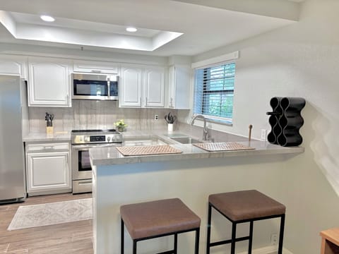 Kitchen & Breakfast Bar...Quartzite Counters & Lake View