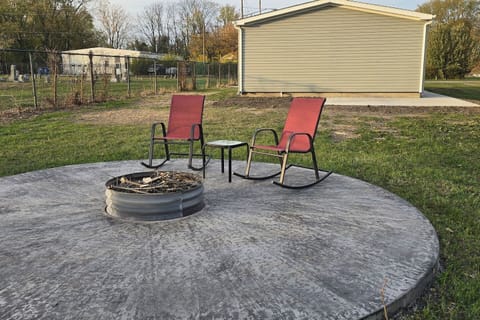 Enjoy cozy evenings by the fire pit—seating for six and open skies for stargazing