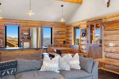 Living room: Gas fireplace, Smart TV, sectional sofa, slope views