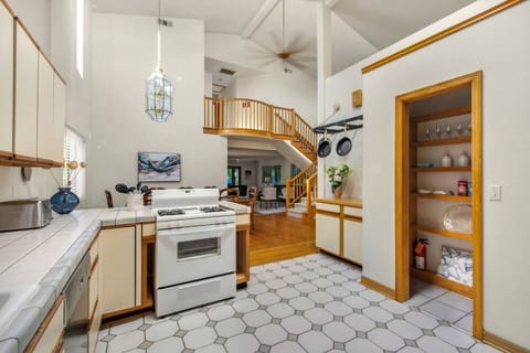 Fully stocked kitchen with all the essentials for cooking.