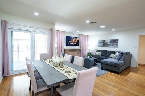 Relax in style with a 65” Smart TV—perfect for cozy family movie nights!