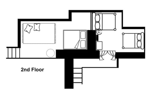 A floor plan of the upper floor. Access to the upper floor is via steep stairs.