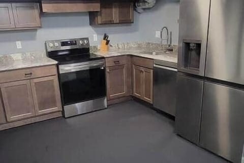 Full stainless and granite kitchen