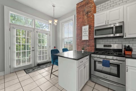 The updated kitchen offers ample space & all the comforts of home