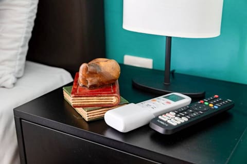 Thoughtful details — bedside lamp and essentials that make you feel right at home.