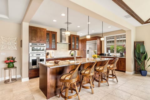 Spacious gourmet kitchen stocked with everything you need to prepare meals