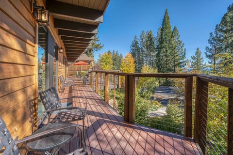 Deck: Upper floor, two outdoor dining sets with umbrellas, sun loungers, seating for 8, access from dining area