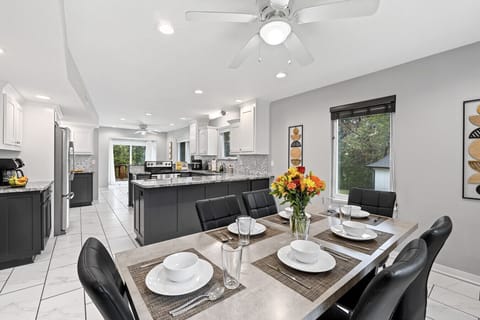 Dining Room | Spacious table for eight with bright natural light