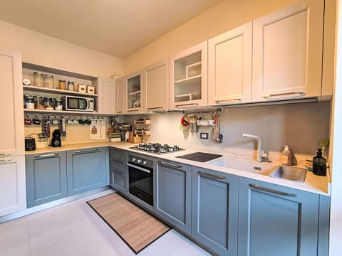 Kitchen, Kitchen Appliance, Major Appliance, Cabinetry, Countertop, Interior Design, Kitchen Stove, Home Appliance, Stove, Cupboard